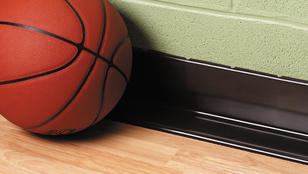 Tarkett basketball flooring with basketball | Markville Carpet & Flooring