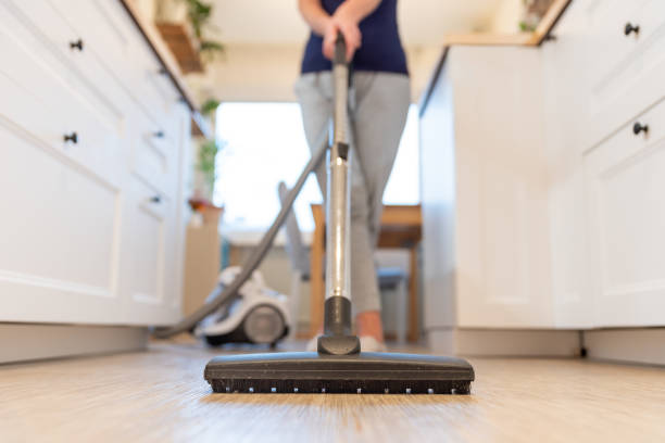 Women cleaning laminate flooring | Markville Carpet & Flooring