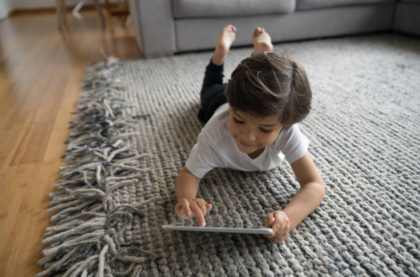 Girl lying on rug | Markville Carpet & Flooring